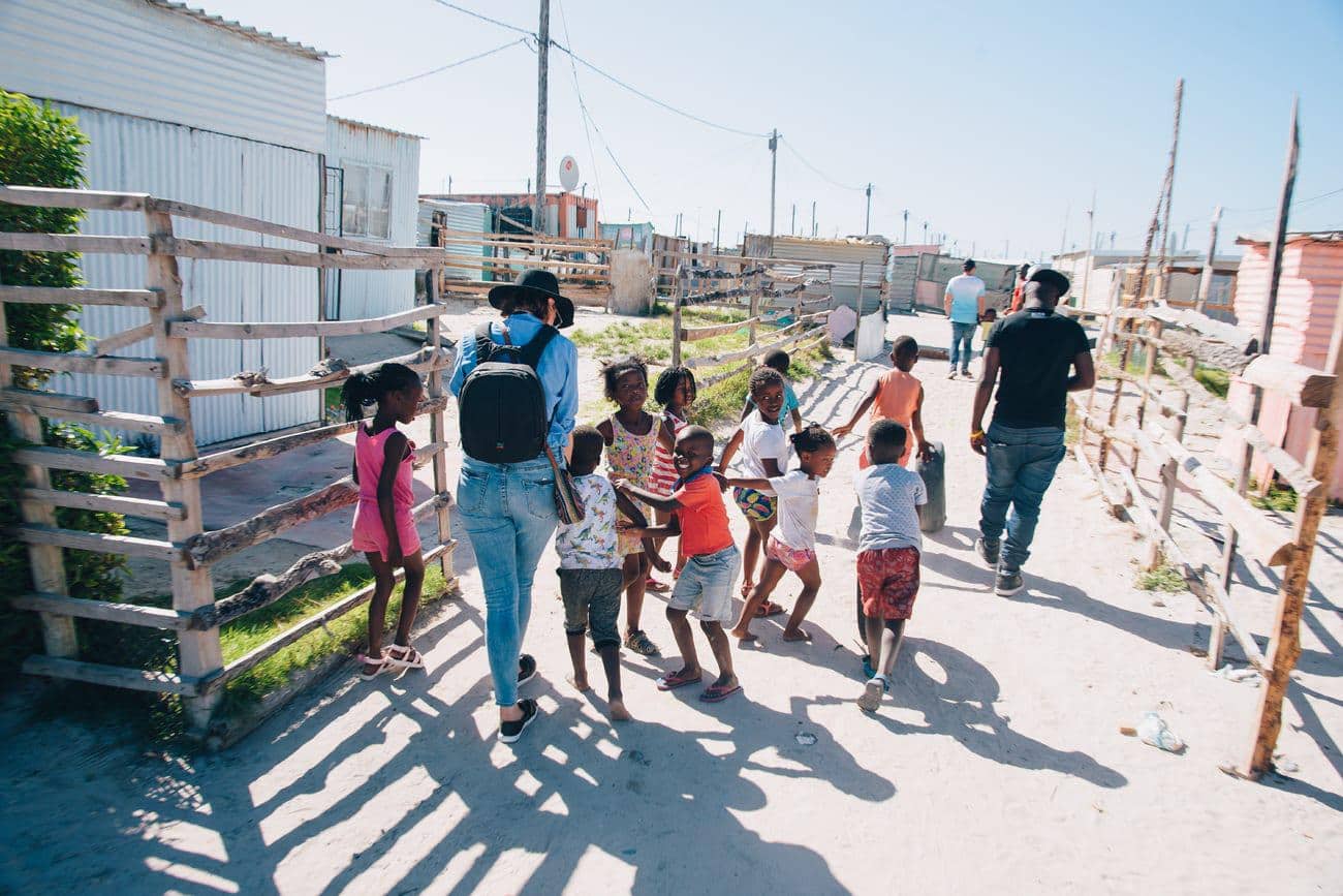 Tourist with children in Khayelitsha