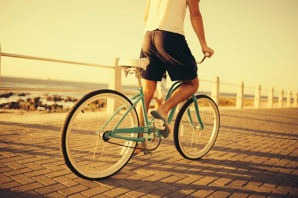 a cyclist on the Sea Point Promenade.
