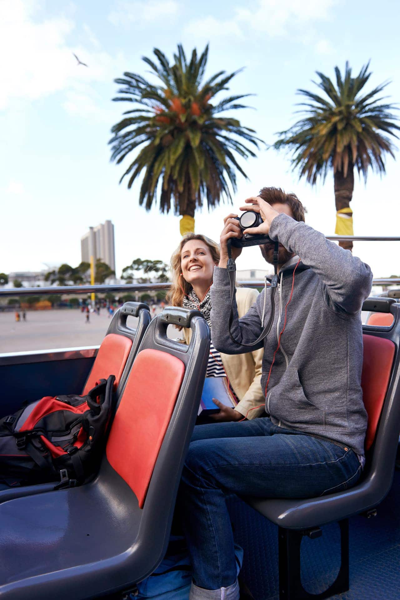 tourists_taking_photos_on_sighseeing_bus_cape_town