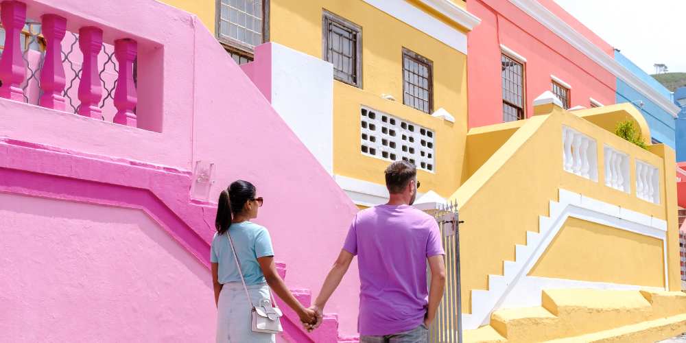 Couple walking in Bo-Kaap Cape Town - Heritage Sites